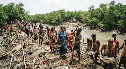 Cyclone relief volunteers distributing aid in the Sundarbans after Cyclone Yaas.